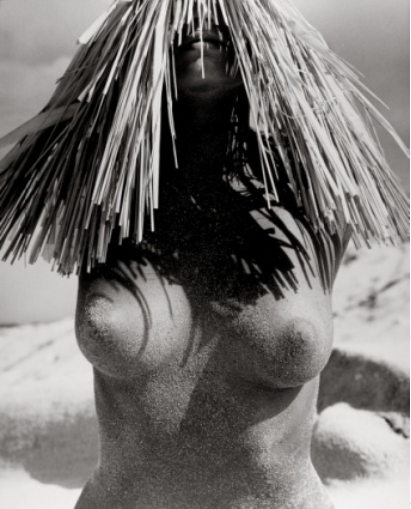 WOMAN WITH STRAW HAT. HAWAII, 1988