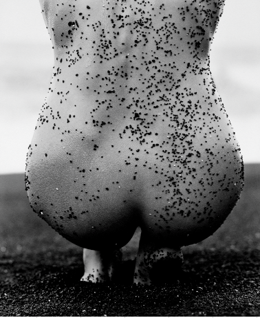 FEMALE NUDE WITH BLACK SAND, HAWAII, 1989