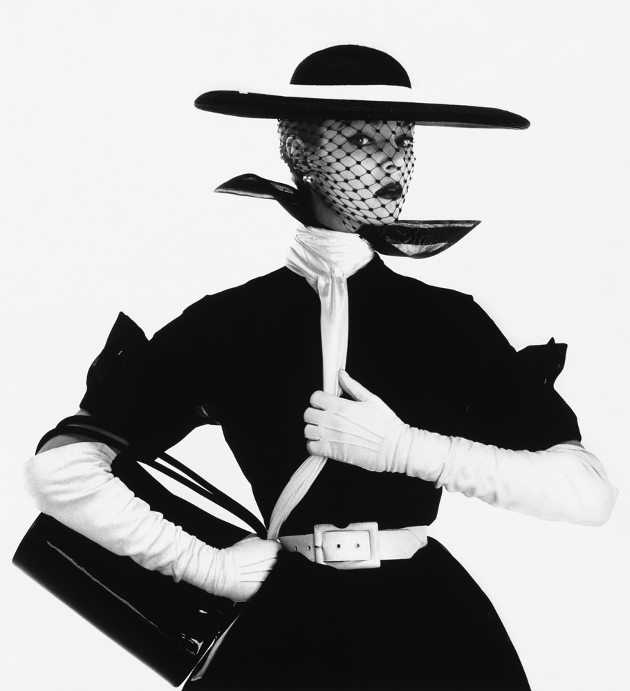 BLACK AND WHITE FASHION WITH HANDBAG. JEAN PATCHETT, NEW YORK, VOGUE USA, APRIL 1950